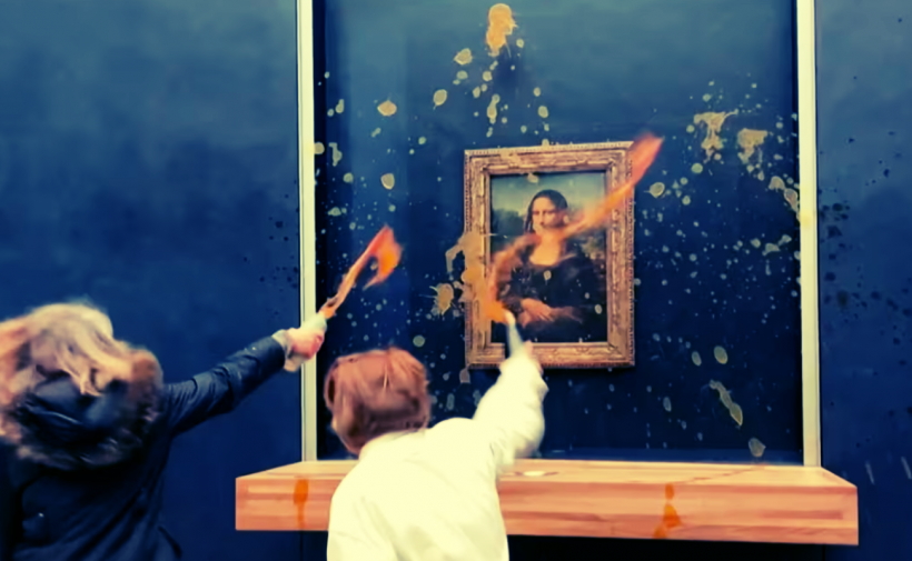 Climate activists hurl a can of soup at the Mona Lisa.