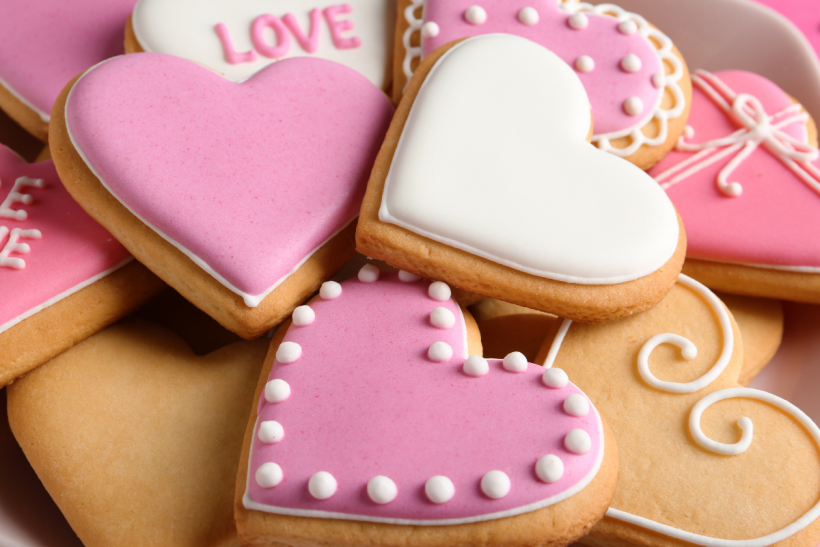 Valentine's cookies in a pile.