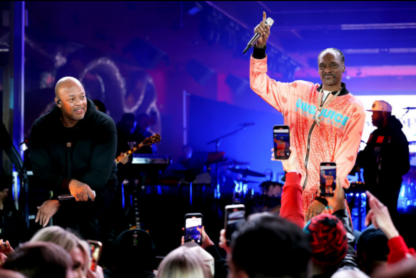Snoop Dogg and Dr. Dre perform on stage during Flipper's Big Game After Party clebrating the release of Gin and Juice.
