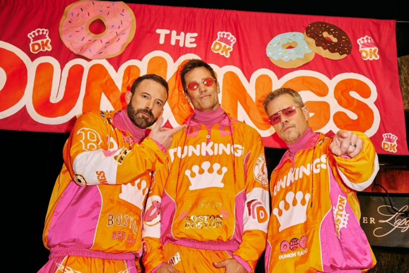 Left to right, Ben Falleck, Tom Brady, and Matt Damon sing for Dunkin’.