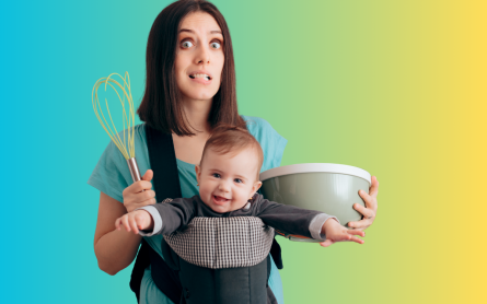 Busy mom trying to cook while holding a baby.