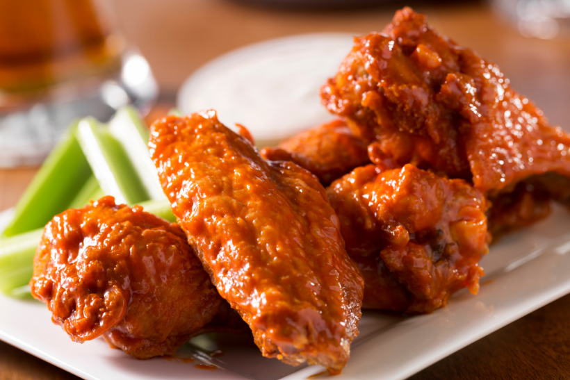 A delicious looking plate of crispy chicken wings.