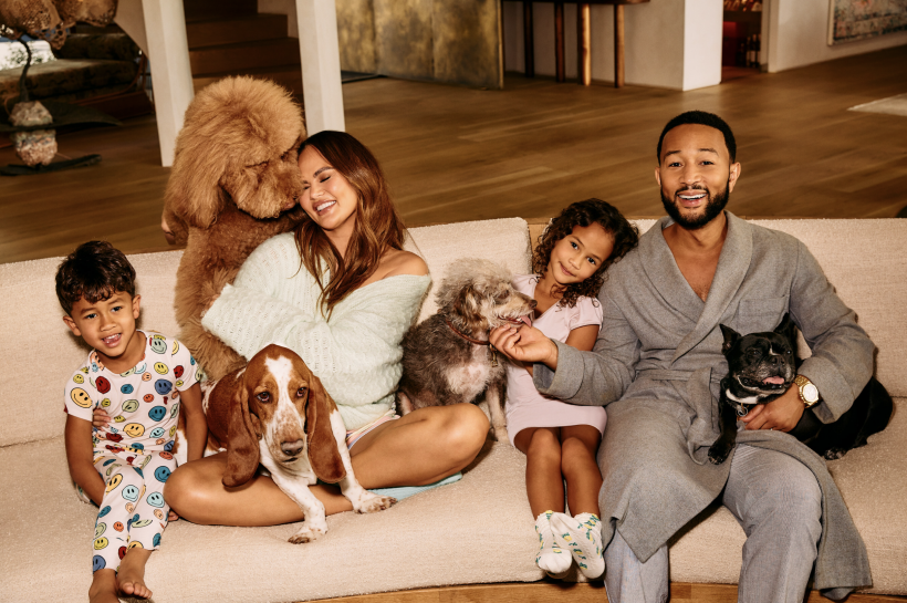Chrissy Teigen and John Legend at home with their family and four dogs.
