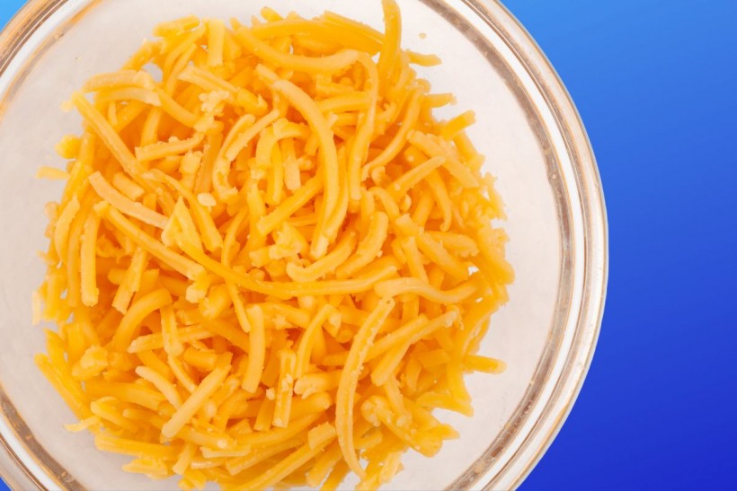 Why are people rinsing shredded cheese?