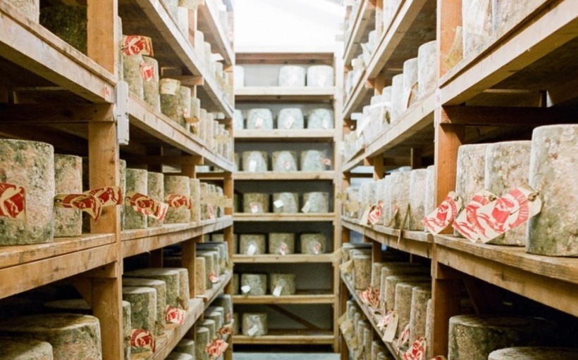 A photo shows cheese at Neal's Yard Dairy.