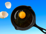 Eggs in a cast iron pan.