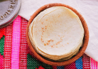 What nutrient is California demanding to be added to corn tortillas?